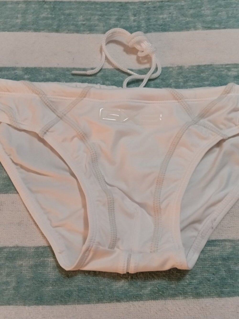 NIB UNIQUE 1" SIDES ASIAN GOTTZU "GX3" SWIM BRIEF, WHITE, ASIAN SIZE "L"